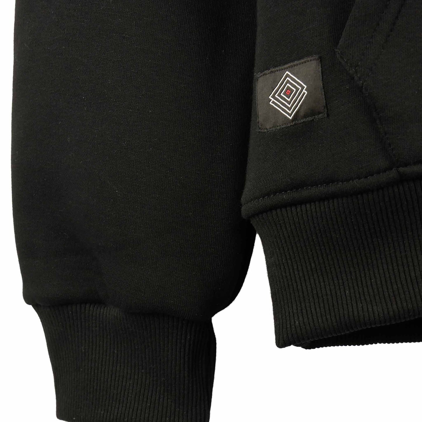 HOODIE BLACK SQUARES Made with soft materials and a luxurious fleece lining, front side close up logo