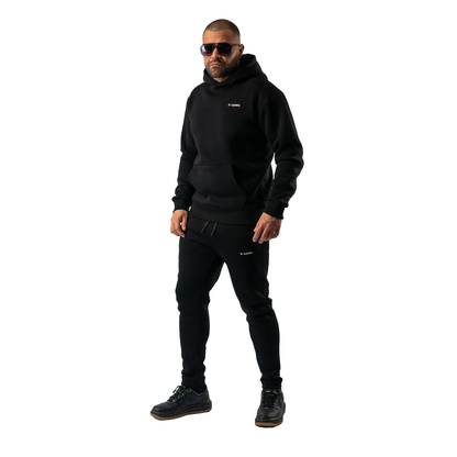 SWEATPANTS BLACK SQUARES Made with soft materials and a luxurious fleece lining, front side model